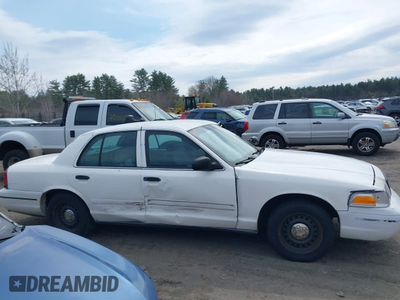 2000 Ford Crown Victoria Police Interceptor z VIN 2FAFP71W6YX169248, wystawiony jako IAAI lot #41974053 z przebiegiem 230 658 mil mil oraz . Historia ofert i sprzedaży dostępna na DreamBid. Obrazek 13.