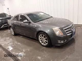 2009 Cadillac CTS RWD z VIN 1G6DF577590137306, wystawiony jako IAAI lot #42343378 z przebiegiem 160 813 mil mil oraz . Historia ofert i sprzedaży dostępna na DreamBid. Obrazek 1.