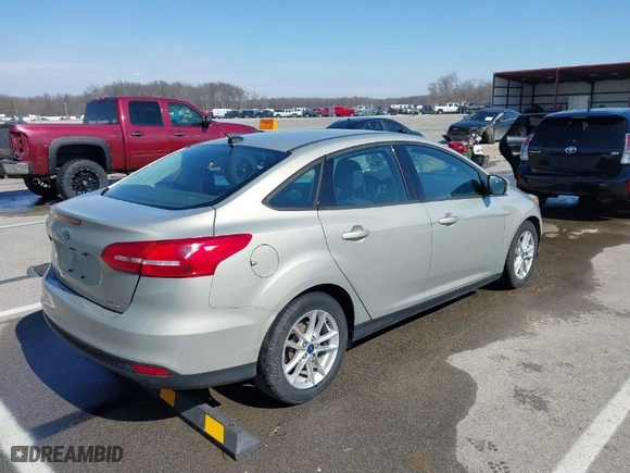 2016 Ford Focus SE with VIN 1FADP3F20GL329724, listed as a IAAI auction lot 41665265 with 131,000 mi miles. Bid and sale history available at carsss.com. Image 4.