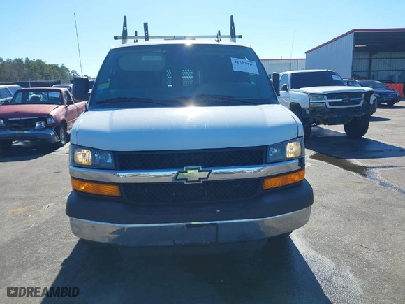 2012 Chevrolet Express Cargo Van with VIN 1GCWGFCA7C1100284, listed as a IAAI auction lot 41327810 with 211,077 mi miles. Bid and sale history available at carsss.com. Image 12.