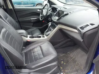 2013 Ford Escape SEL with VIN 1FMCU9H92DUA47288, listed as a IAAI auction lot 41912588 with 165,728 mi miles. Bid and sale history available at carsss.com. Image 5.
