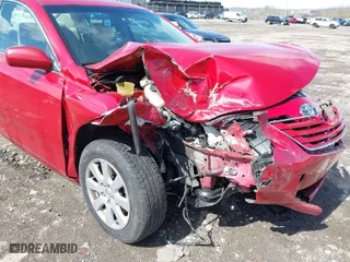 2007 Toyota Camry CE with VIN JTNBE46K573115563, listed as a IAAI auction lot 41971937 with 132,427 mi miles. Bid and sale history available at carsss.com. Image 6.