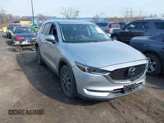 2018 Mazda CX-5 Grand Touring with VIN JM3KFBDMXJ0304428, listed as a IAAI auction lot 41740238 with 108,012 mi miles and . Bid and sale history available at DreamBid. Image 1.