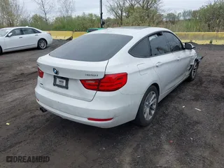 2014 BMW 3 Series Gran Turismo 328i xDrive with VIN WBA3X5C5XED559713, listed as a IAAI auction lot 42078622 with 68,233 mi miles. Bid and sale history available at carsss.com. Image 4.