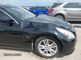 2015 Infiniti Q40 with VIN JN1CV6AP5FM502116, listed as a IAAI auction lot 41894061 with 101,358 mi miles. Bid and sale history available at carsss.com. Image 6.