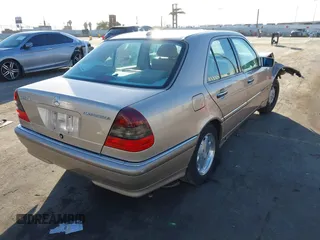2000 Mercedes-Benz C 230 Kompressor with VIN WDBHA24G9YA856825, listed as a IAAI auction lot 41418925 with 99,616 mi miles and . Bid and sale history available at carsss.com. Image 4.