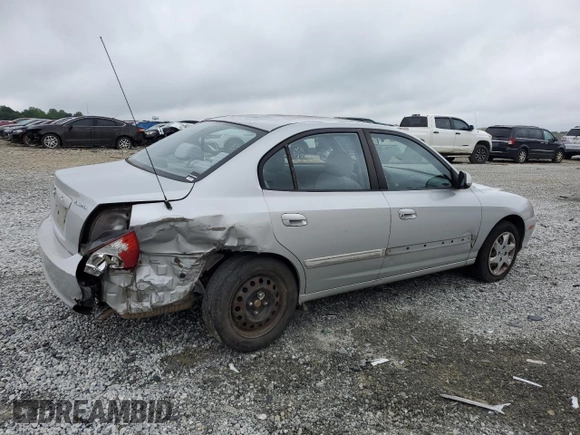 2004 Hyundai Elantra GLS z VIN KMHDN46D34U859307, wystawiony jako Copart lot #53847235 z przebiegiem 91 939 mil mil oraz Szkoda całkowita • Salvage title. Historia ofert i sprzedaży dostępna na DreamBid. Obrazek 3.