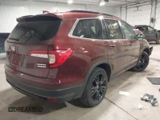 2022 Honda Pilot Special Edition with VIN 5FNYF6H23NB027017, listed as a IAAI auction lot 41953810 with 23,422 mi miles and . Bid and sale history available at DreamBid. Image 4.