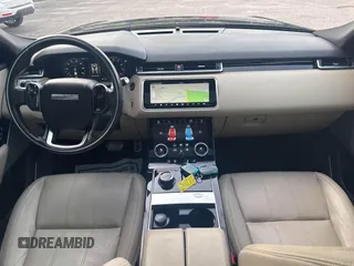 2018 Land Rover Range Rover Velar R-Dynamic SE z VIN SALYL2RX7JA715416, wystawiony jako IAAI lot #42533511 z przebiegiem 123 921 mil mil oraz . Historia ofert i sprzedaży dostępna na DreamBid. Obrazek 6.