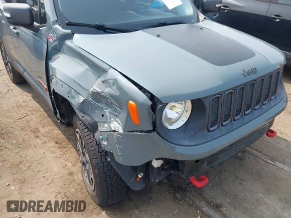 2015 Jeep Renegade Trailhawk with VIN ZACCJBCT0FPC01671, listed as a IAAI auction lot 42406869 with Not provided miles and . Bid and sale history available at DreamBid. Image 6.