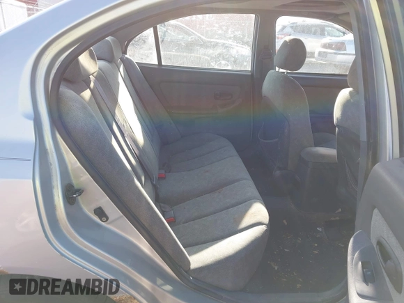 2003 Hyundai Elantra GLS z VIN KMHDN45D63U553542, wystawiony jako IAAI lot #42032294 z przebiegiem 164 210 mil mil oraz . Historia ofert i sprzedaży dostępna na DreamBid. Obrazek 8.