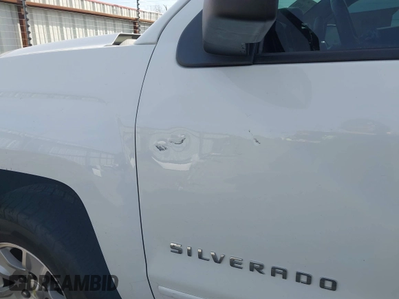 2017 Chevrolet Silverado 1500 LT with VIN 3GCUKREC5HG414935, listed as a IAAI auction lot 41064938 with 197,767 mi miles and . Bid and sale history available at DreamBid. Image 19.