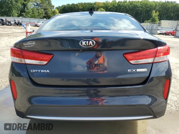 2017 Kia Optima Hybrid EX with VIN KNAGU4LE8H5010014, listed as a Copart auction lot 70926724 with 49,745 mi miles and Salvage Title. Bid and sale history available at carsss.com. Image 6.