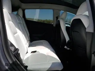 2023 Tesla Model Y Long Range z VIN 7SAYGAEE9PF662103, wystawiony jako Copart lot #51332105 z przebiegiem 35 294 mil mil oraz Szkody całkowita. Historia ofert i sprzedaży dostępna na DreamBid. Obrazek 10.