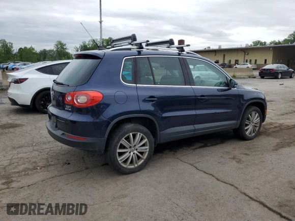 2011 Volkswagen Tiguan SEL z VIN WVGBV7AX2BW534482, wystawiony jako Copart lot #61097265 z przebiegiem 186 282 mil mil oraz Czysty tytuł • Clean title. Historia ofert i sprzedaży dostępna na DreamBid. Obrazek 3.