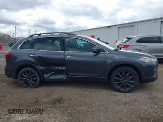 2015 Mazda CX-9 Grand Touring with VIN JM3TB3DV1F0465966, listed as a IAAI auction lot 42049749 with 74,470 mi miles and . Bid and sale history available at DreamBid. Image 13.
