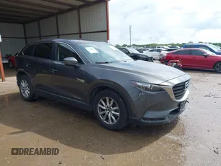 2016 Mazda CX-9 Sport z VIN JM3TCABY5G0122478, wystawiony jako IAAI lot #42115795 z przebiegiem 134 980 mil mil oraz . Historia ofert i sprzedaży dostępna na DreamBid. Obrazek 1.