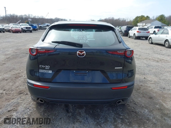 2021 Mazda CX-30 S with VIN 3MVDMBAL5MM214185, listed as a IAAI auction lot 41800888 with 33,267 mi miles and . Bid and sale history available at carsss.com. Image 16.