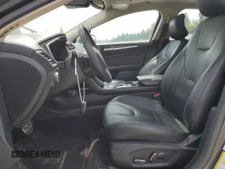 2017 Ford Fusion Titanium z VIN 3FA6P0K95HR139060, wystawiony jako Copart lot #62200755 z przebiegiem 106 133 mil mil oraz Szkoda całkowita • Salvage title. Historia ofert i sprzedaży dostępna na DreamBid. Obrazek 7.