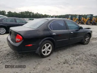 2000 Nissan Maxima GXE z VIN JN1CA31A8YT210913, wystawiony jako Copart lot #56272455 z przebiegiem 281 645 mil mil oraz Nie do naprawy • Non repairable. Historia ofert i sprzedaży dostępna na DreamBid. Obrazek 3.