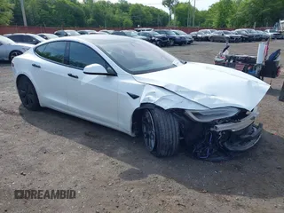 2022 Tesla Model S with VIN 5YJSA1E58NF467644, listed as a IAAI auction lot 42344403 with 52,628 mi miles and . Bid and sale history available at DreamBid. Image 19.