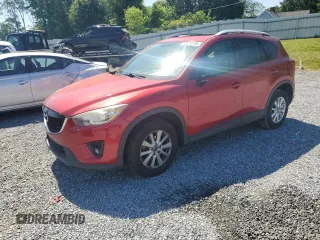 2014 Mazda CX-5 Touring z VIN JM3KE2CY0E0381855, wystawiony jako Copart lot #53328785 z przebiegiem 119 076 mil mil oraz Szkoda całkowita • Salvage title. Historia ofert i sprzedaży dostępna na DreamBid. Obrazek 1.
