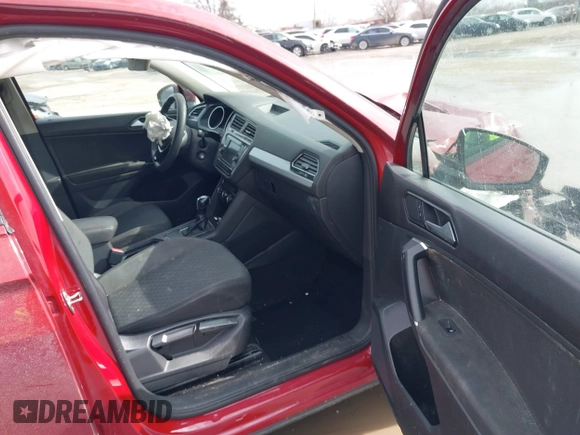 2018 Volkswagen Tiguan S with VIN 3VV1B7AX9JM085312, listed as a IAAI auction lot 41656827 with 122,322 mi miles and . Bid and sale history available at DreamBid. Image 5.