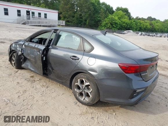 2021 Kia Forte LXS with VIN 3KPF24AD9ME347076, listed as a IAAI auction lot 42289157 with 59,095 mi miles and . Bid and sale history available at DreamBid. Image 3.