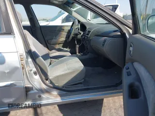 2002 Nissan Sentra GXE z VIN 3N1CB51DX2L663011, wystawiony jako IAAI lot #42533399 z przebiegiem 176 956 mil mil oraz . Historia ofert i sprzedaży dostępna na DreamBid. Obrazek 5.