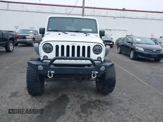 2014 Jeep Wrangler Unlimited Rubicon with VIN 1C4BJWFGXEL283929, listed as a IAAI auction lot 41812052 with 137,790 mi miles and . Bid and sale history available at DreamBid. Image 12.