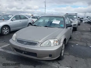2000 Honda Civic DX with VIN 1HGEJ6625YL058339, listed as a IAAI auction lot 41521835 with 120,282 mi miles. Bid and sale history available at carsss.com. Image 17.