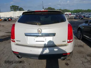 2014 Cadillac SRX Performance Collection with VIN 3GYFNCE36ES662689, listed as a IAAI auction lot 42109417 with 132,957 mi miles. Bid and sale history available at carsss.com. Image 16.