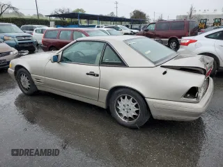 1996 Mercedes-Benz SL-Class with VIN WDBFA67FXTF133854, listed as a Copart auction lot 48659595 with 117,804 mi miles and Salvage Title. Bid and sale history available at carsss.com. Image 2.