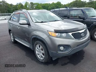 2012 Kia Sorento LX with VIN 5XYKT3A60CG285902, listed as a IAAI auction lot 42142043 with 225,206 mi miles. Bid and sale history available at carsss.com. Image 1.