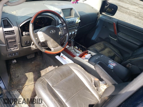 2007 Infiniti QX56 z VIN 5N3AA08C87N806622, wystawiony jako Copart lot #57411845 z przebiegiem 218 557 mil mil oraz Czysty tytuł • Clean title. Historia ofert i sprzedaży dostępna na DreamBid. Obrazek 8.