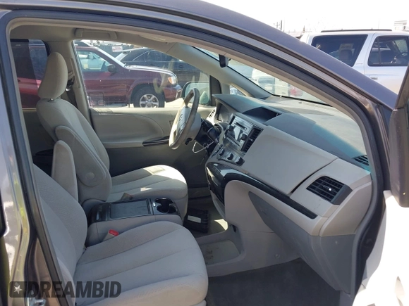 2012 Toyota Sienna LE AAS with VIN 5TDKK3DC9CS184722, listed as a IAAI auction lot 41942991 with 227,783 mi miles. Bid and sale history available at carsss.com. Image 5.