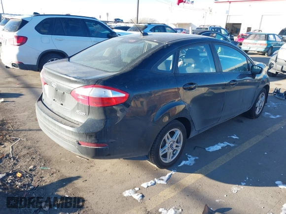 2017 Ford Fiesta SE z VIN 3FADP4BJ6HM125903, wystawiony jako IAAI lot #41376018 z przebiegiem 114 628 mil mil oraz . Historia ofert i sprzedaży dostępna na DreamBid. Obrazek 4.