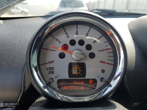 2012 MINI Countryman S with VIN WMWZC5C54CWL57554, listed as a Copart auction lot 59699865 with 144,737 mi miles and Salvage title. Bid and sale history available at DreamBid. Image 9.