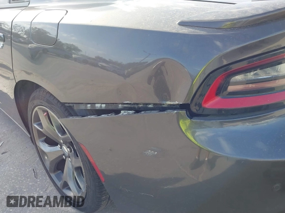 2015 Dodge Charger RT with VIN 2C3CDXCT9FH819971, listed as a IAAI auction lot 40592010 with 154,386 mi miles and . Bid and sale history available at DreamBid. Image 18.