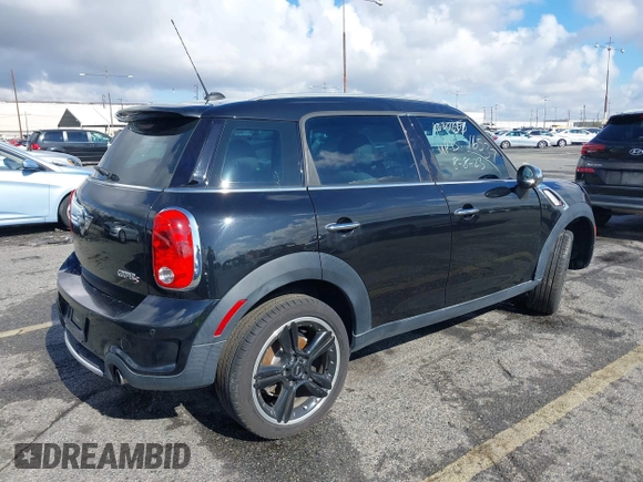 2014 MINI Countryman S with VIN WMWZC3C56EWP27880, listed as a IAAI auction lot 38577048 with 96,812 mi miles and . Bid and sale history available at DreamBid. Image 4.
