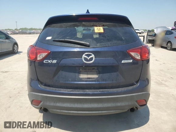 2014 Mazda CX-5 Touring z VIN JM3KE2CYXE0327950, wystawiony jako Copart lot #51390585 z przebiegiem 129 523 mil mil oraz Czysty tytuł • Clean title. Historia ofert i sprzedaży dostępna na DreamBid. Obrazek 6.