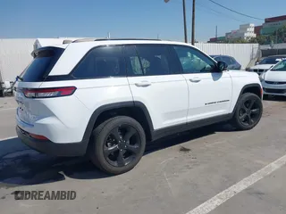 2023 Jeep Grand Cherokee Laredo with VIN 1C4RJHAGXPC660392, listed as a IAAI auction lot 41845564 with 7,444 mi miles and . Bid and sale history available at DreamBid. Image 4.