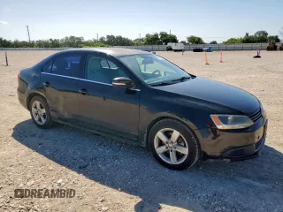 2013 Volkswagen Jetta TDI w/Premium z VIN 3VWLL7AJ7DM232096, wystawiony jako Copart lot #57265725 z przebiegiem 120 361 mil mil oraz Szkoda całkowita • Salvage title. Historia ofert i sprzedaży dostępna na DreamBid. Obrazek 4.