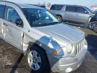 2008 Jeep Compass Sport with VIN 1J8FT47098D665734, listed as a IAAI auction lot 41561801 with 169,446 mi miles. Bid and sale history available at carsss.com. Image 6.