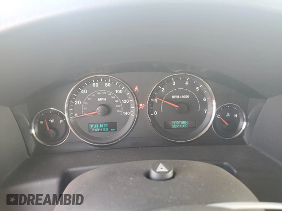 2007 Jeep Commander Limited with VIN 1J8HG58P87C595890, listed as a Copart auction lot 71123654 with 148,438 mi miles and Salvage Title. Bid and sale history available at carsss.com. Image 9.