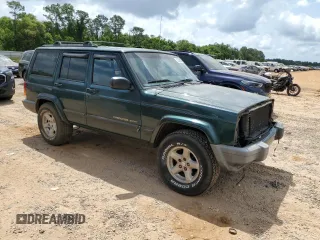 2001 Jeep Cherokee Sport with VIN 1J4FT48SX1L590135, listed as a Copart auction lot 53502945 with 362,941 mi miles and Non Repairable. Bid and sale history available at carsss.com. Image 4.