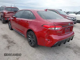 2024 Toyota Corolla Hybrid LE with VIN JTDBCMFE0RJ020198, listed as a IAAI auction lot 40510015 with 35,230 mi miles. Bid and sale history available at carsss.com. Image 3.