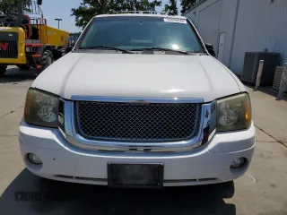 2006 GMC Envoy SLE z VIN 1GKDT13S762345183, wystawiony jako Copart lot #60096645 z przebiegiem 249 658 mil mil oraz Szkoda całkowita • Salvage title. Historia ofert i sprzedaży dostępna na DreamBid. Obrazek 5.