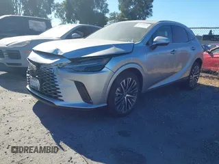 2025 Lexus RX 350h with VIN 2T2BBMCA8SC084121, listed as a IAAI auction lot 42644072 with 4,200 mi miles and . Bid and sale history available at DreamBid. Image 2.