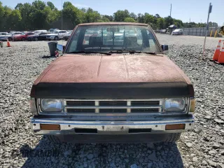 1991 Nissan Frontier XE with VIN 1N6SD11S2MC412375, listed as a Copart auction lot 61015515 with 201,629 mi miles and Salvage title. Bid and sale history available at DreamBid. Image 5.